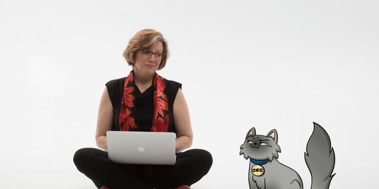 "This is one of me (Liz) and a character from my books, Hubble the cat, from Geeky F@b Five graphic novel series I co-author with My 14-year old daughter. It's a series that focuses on girls and STEM and how they can use their talents to make a difference."